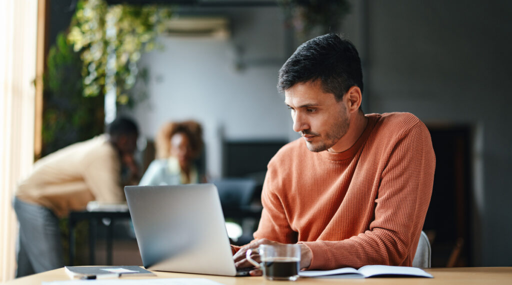 Man looking at B2B Marketplaces